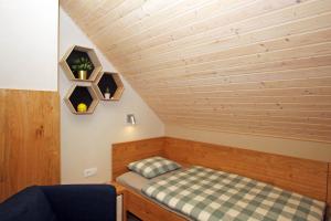 Postel nebo postele na pokoji v ubytování Apartma - Počitniška hiša Lodi