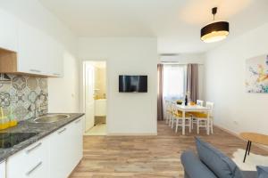 Kuchyň nebo kuchyňský kout v ubytování Holiday Apartments Dubrovnik