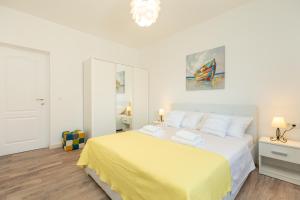 Postel nebo postele na pokoji v ubytování Holiday Apartments Dubrovnik