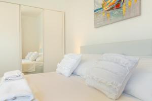 Postel nebo postele na pokoji v ubytování Holiday Apartments Dubrovnik