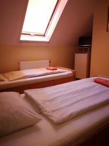 Postel nebo postele na pokoji v ubytování Hotel Amarillis