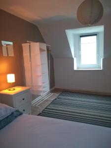 Postel nebo postele na pokoji v ubytování La Maison de Leonie
