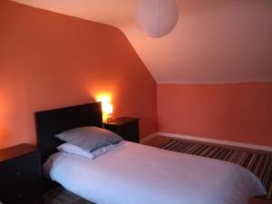 Postel nebo postele na pokoji v ubytování La Maison de Leonie