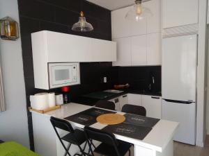 Albaicin Taurino Apartmentにあるキッチンまたは簡易キッチン