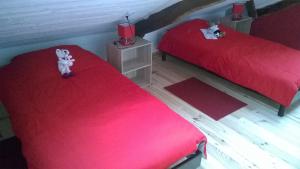 Postel nebo postele na pokoji v ubytování Chez Suzette & John