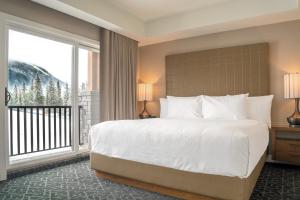 The Malcolm Hotel客房内的一张或多张床位
