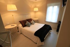 Postel nebo postele na pokoji v ubytování Hotel Poldo