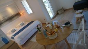 Ein Bett oder Betten in einem Zimmer der Unterkunft Le Petit Vue Mer