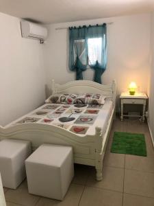 Postel nebo postele na pokoji v ubytování La tourterelle de Neron