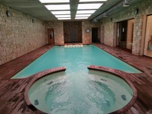 Bazén v ubytování Beautiful penthouse with 3 pools nebo v jeho okolí