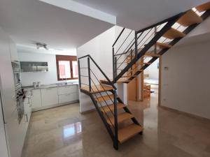 Kuchyň nebo kuchyňský kout v ubytování Beautiful penthouse with 3 pools