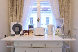 Príslušenstvo na prípravu kávy alebo čaju v ubytovaní Apartment Arum-Lily