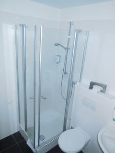 Koupelna v ubytování Hotel Garni am Hechenberg