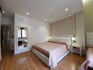 Katil atau katil-katil dalam bilik di Guest House Piazza Carmine