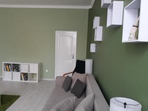 Postel nebo postele na pokoji v ubytování HEMNES Apartman
