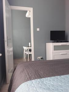 TV a/nebo společenská místnost v ubytování HEMNES Apartman