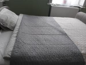 Postel nebo postele na pokoji v ubytování HEMNES Apartman