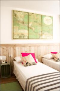 Кровать или кровати в номере Casa Vacanze Enjoy Pirano