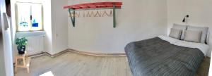 Posteľ alebo postele v izbe v ubytovaní Apartmány CAFÉ-CAFÉ