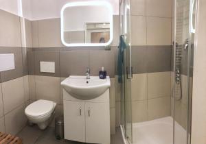 Kúpeľňa v ubytovaní Apartmány CAFÉ-CAFÉ