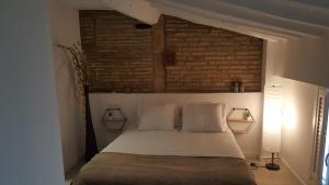 Katil atau katil-katil dalam bilik di La casita del Laurel, casa entera, wifi