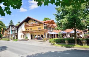 a building on the side of a street at Landhotel Böld Oberammergau in Oberammergau