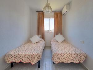 Cama o camas de una habitación en Holiday Home Campo Olivar by Interhome
