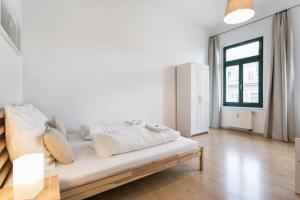 Ruhiges Apartment am Rande des Szeneviertelsにあるベッド