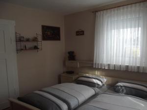 Ένα ή περισσότερα κρεβάτια σε δωμάτιο στο Ferienwohnung Seifert