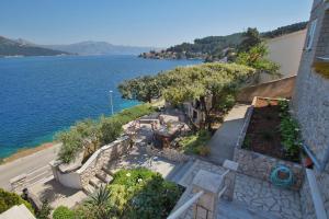 a view of the water from a building at Apartments Mirna in Korčula