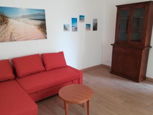 Posezení v ubytování AGLI OLEANDRI appartamento in villa con con parcheggio
