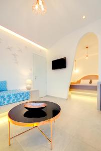 Telewizja i/lub zestaw kina domowego w obiekcie Emerald Collection Suites