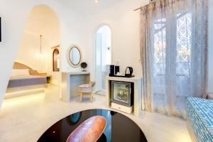 Łóżko lub łóżka w pokoju w obiekcie Emerald Collection Suites