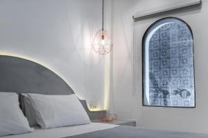 Łóżko lub łóżka w pokoju w obiekcie Emerald Collection Suites