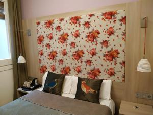 Posteľ alebo postele v izbe v ubytovaní Hotel Ginebra