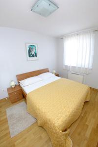 Postel nebo postele na pokoji v ubytování Lila Apartments