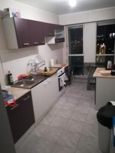 Kuchyň nebo kuchyňský kout v ubytování A 20 minutes de Paris