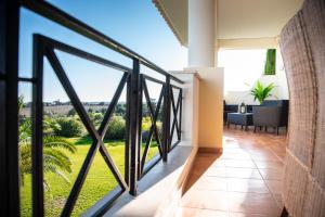 a view from the balcony of a house with a view at Colina Verde Resort in Moncarapacho