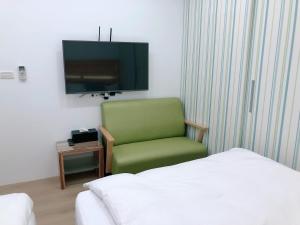 Een TV en/of entertainmentcenter bij Penghu Little Apple B&B
