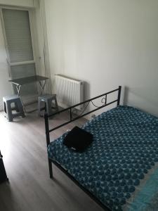 Postel nebo postele na pokoji v ubytování A 20 minutes de Paris