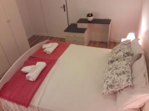 Postel nebo postele na pokoji v ubytování Apartments Verica