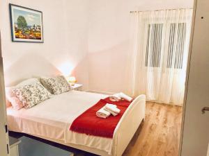 Postel nebo postele na pokoji v ubytování Apartments Verica