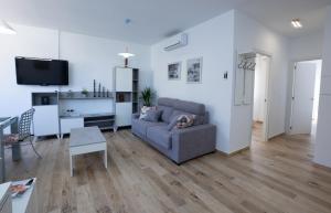 TV a/nebo společenská místnost v ubytování Apartamento Nerja Medina