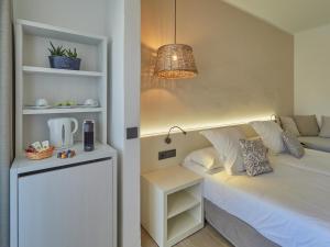 Postel nebo postele na pokoji v ubytování Paguera Treff Boutique Hotel