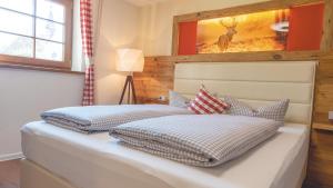 Postel nebo postele na pokoji v ubytování Boutique Hotel beim Lipp - Restaurant & Spa