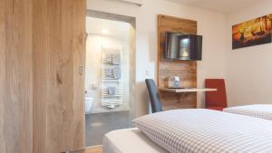 Postel nebo postele na pokoji v ubytování Boutique Hotel beim Lipp - Restaurant & Spa