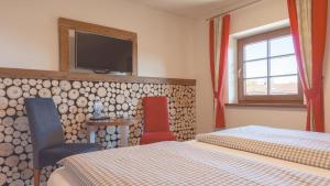 TV a/nebo společenská místnost v ubytování Boutique Hotel beim Lipp - Restaurant & Spa