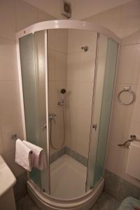 Kúpeľňa v ubytovaní Apartmani Loreta