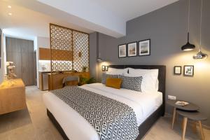 Katil atau katil-katil dalam bilik di F & B Collection - Seaview MiniLux