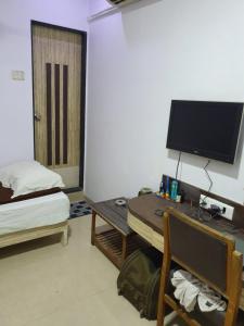 Katil atau katil-katil dalam bilik di Hotel Apex